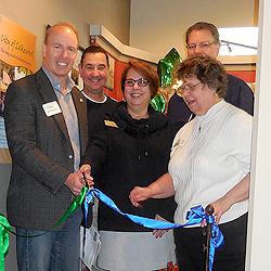 Deputy Mayor Jason Whalen cuts the ribbon, accompanied by County Council Chairman Doug Richardson and City Council Members Marie Barth and Paul Bocchi.