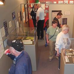 Visitors begin making their way into the main exhibit room.