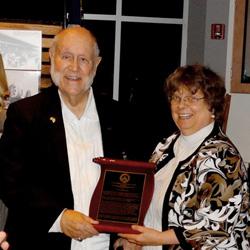 Dr. Jerry Ramsey receives Cyrus Happy III Historian of the Year Award.